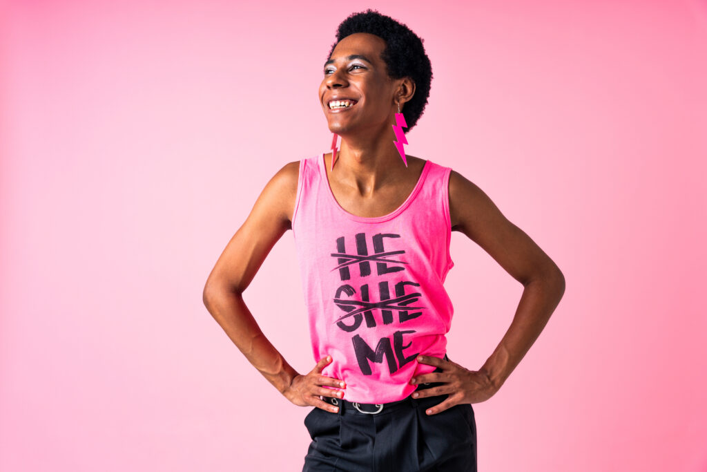 Fluid gender hispanic latin black man posing in studio with fashionable clothing, concepts about LGBTQ, genderless and diversity