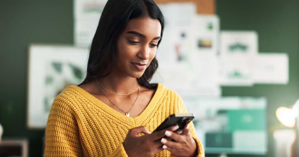 Woman holding smart phone for AI Therapy